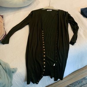 Dark green cardigan w brass colored button detail. Long sleeved